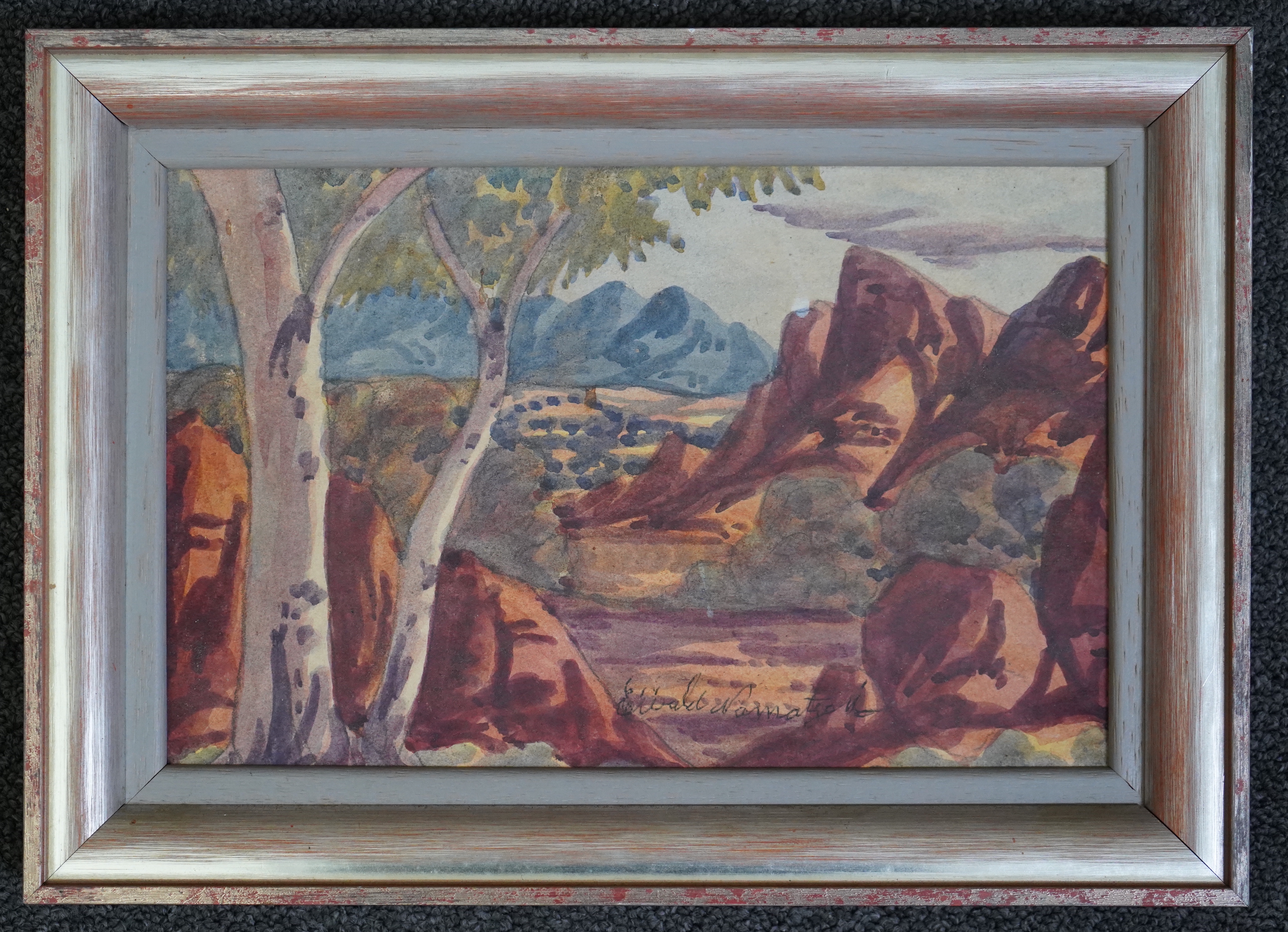 Ewald Namatjira (Australian, 1930-1984), Central Australian landscape, watercolour, 16.5 x 25.5cm